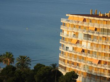 High angle view of city by sea