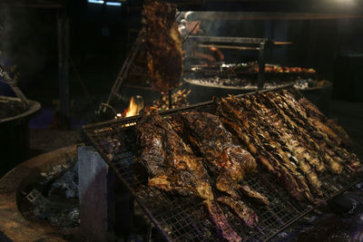 Close-up of  meat on barbecue grill