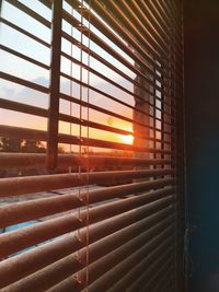 Sunlight streaming through window during sunset