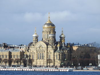 View of buildings against sky during winter