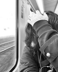 Portrait of woman in train