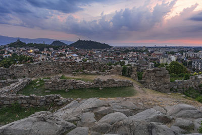 Aerial view of townscape against sky during sunset