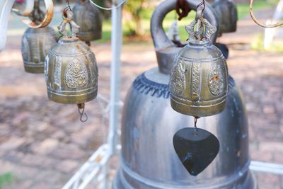 Close-up of lantern hanging on table