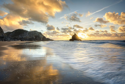 Scenic view of sea against sky during sunset