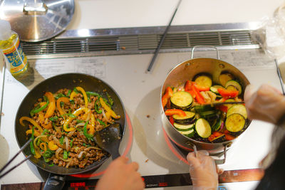 High angle view of person preparing food in kitchen