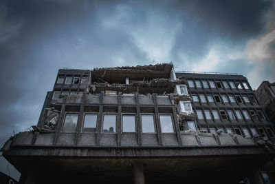 Low angle view of old building against sky