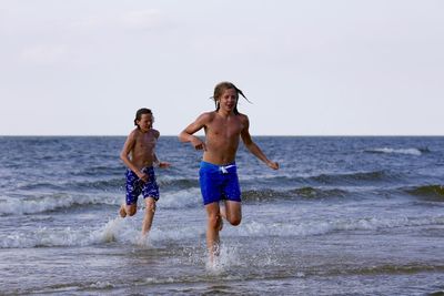 Man jumping on shore