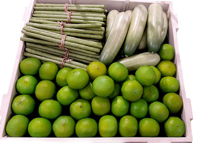 Green fruits for sale in market