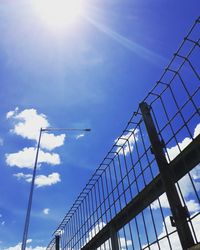 Low angle view of office building against blue sky