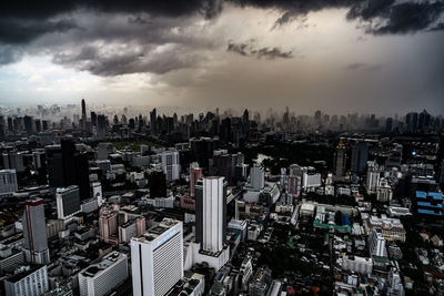 Aerial view of cityscape against sky