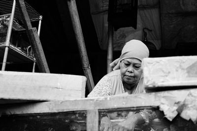 Low angle view of woman working at construction site