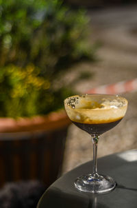 Close-up of empty cocktail  glass on table