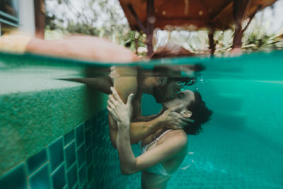 Woman swimming in pool