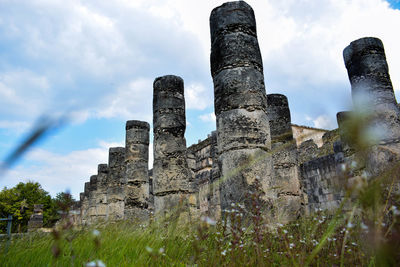 Low angle view of old ruin against sky