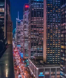 View of city lit up at night