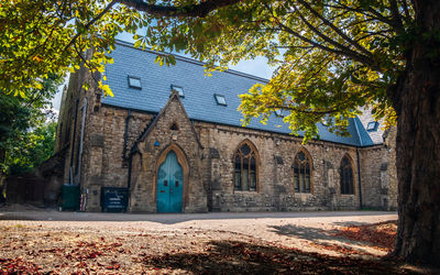 Exterior of historic building against sky during autumn