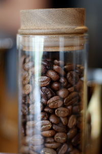 Close-up of coffee beans on table