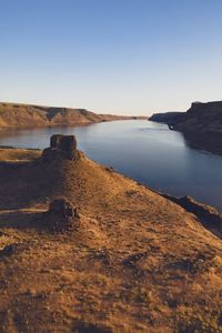 Scenic view of sea against clear sky