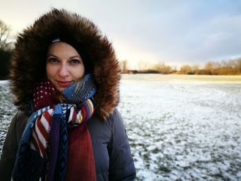 Portrait of young woman in snow