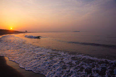 Scenic view of sea against sky during sunset