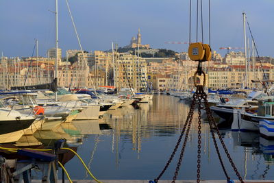 Boats moored in harbor