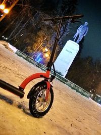 High angle view of bicycle on illuminated road