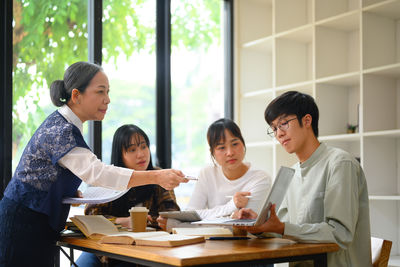 Business colleagues working at office