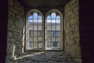 Low angle view of window in old building