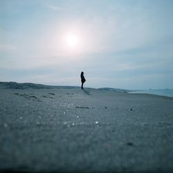 People standing on shore