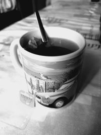 High angle view of coffee cup on table