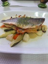 Close-up of fish in plate on table