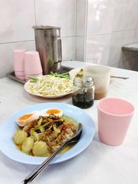 High angle view of breakfast served on table