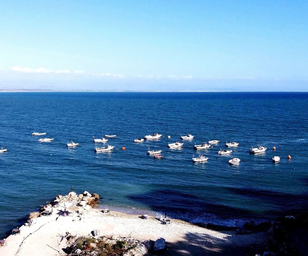 sea, water, blue, beach, scenics, tranquility, shore, tranquil scene, beauty in nature, nature, sky, non-urban scene, day, non urban scene, seascape, no people, ocean