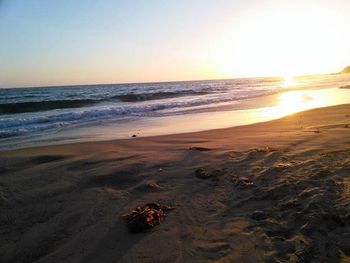 Scenic view of sea at sunset