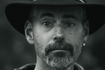 Close-up of man wearing hat