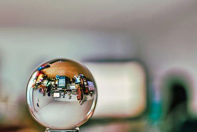 Close-up of toy on mirror