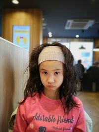 Portrait of cute girl in cafe