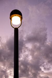 Low angle view of street light against sky