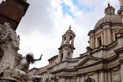 Low angle view of statue against sky