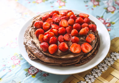 Homemade cake with fresh strawberries.