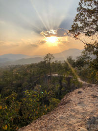 Scenic view of landscape against sky during sunset