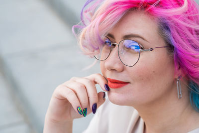 Portrait of beautiful woman with nail art