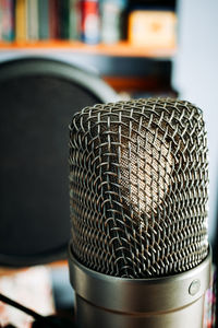 Close-up of electric lamp on table