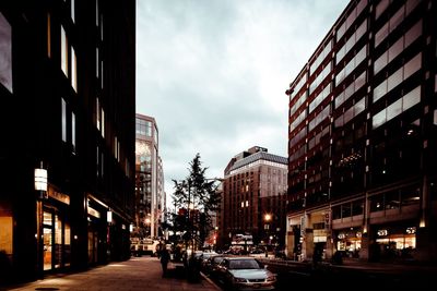 Panoramic view of illuminated city against sky at night