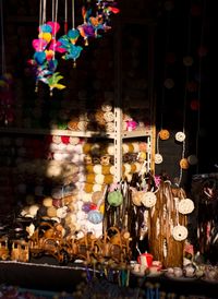 Multi colored umbrellas hanging at market stall