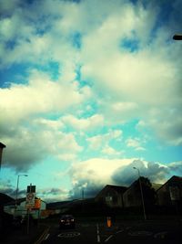 View of road against cloudy sky