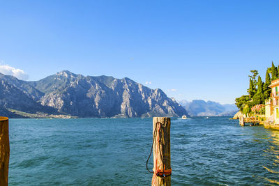 Scenic view of mountains against clear blue sky