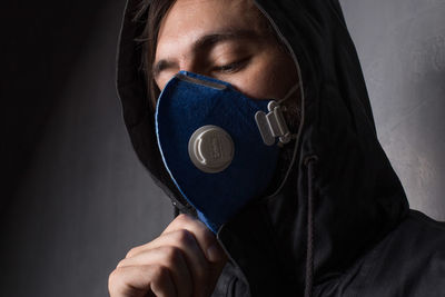 Man wearing pollution mask