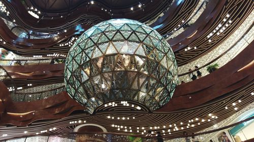 Low angle view of illuminated ceiling of building