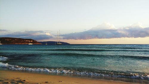 Scenic view of calm sea at sunset